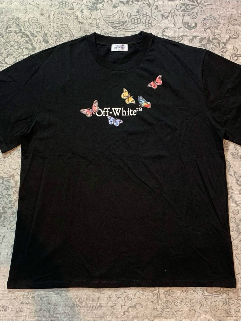 Off-White Black Tee with Multicolor Butterfly Motif